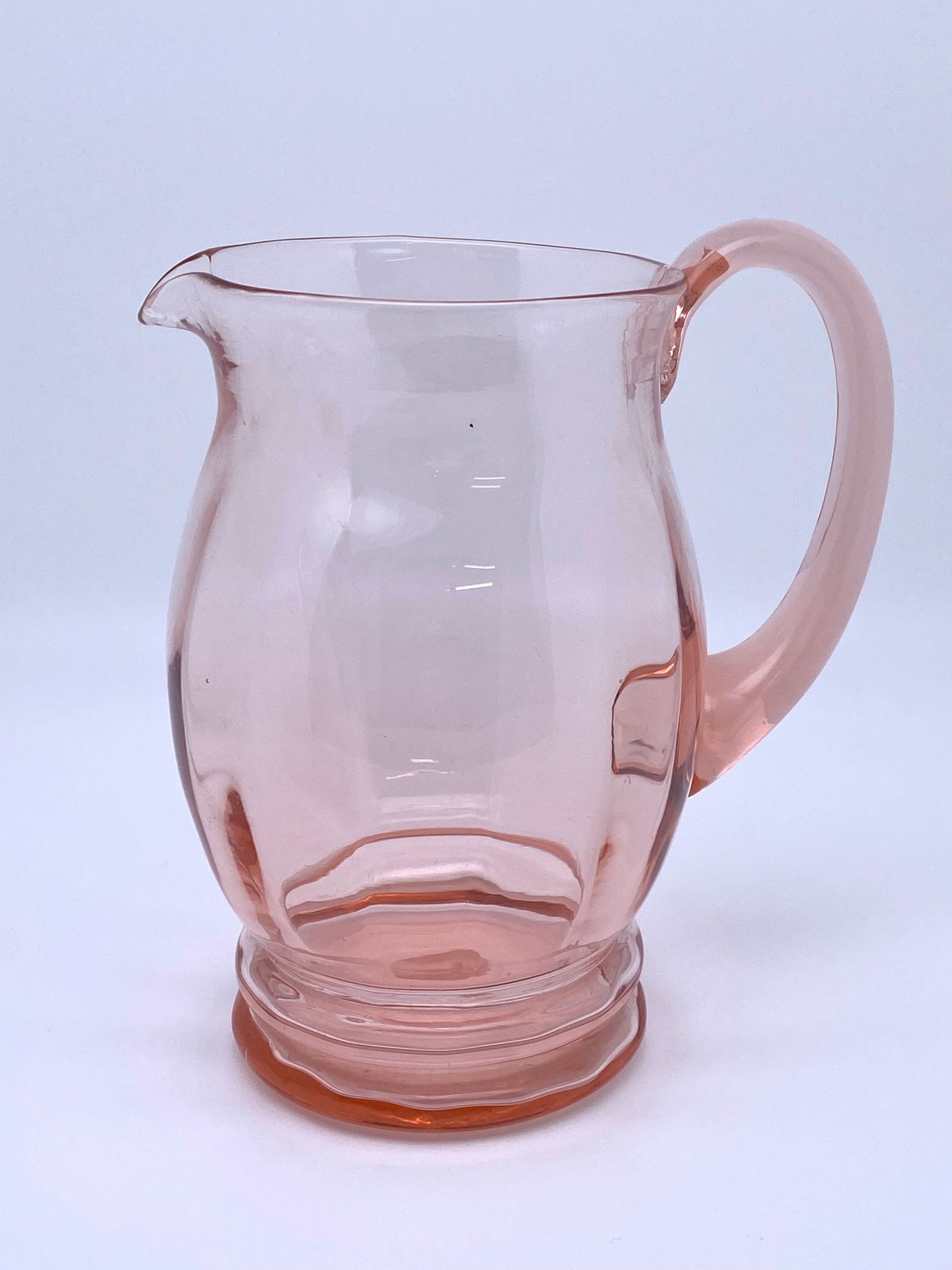 Rounded pink glass decanter