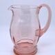 Rounded pink glass decanter
