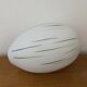 White opaline tulip with dark green and gray streaks. Oblong shape.