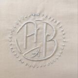 Two matching mixed pillowcases embroidered A B