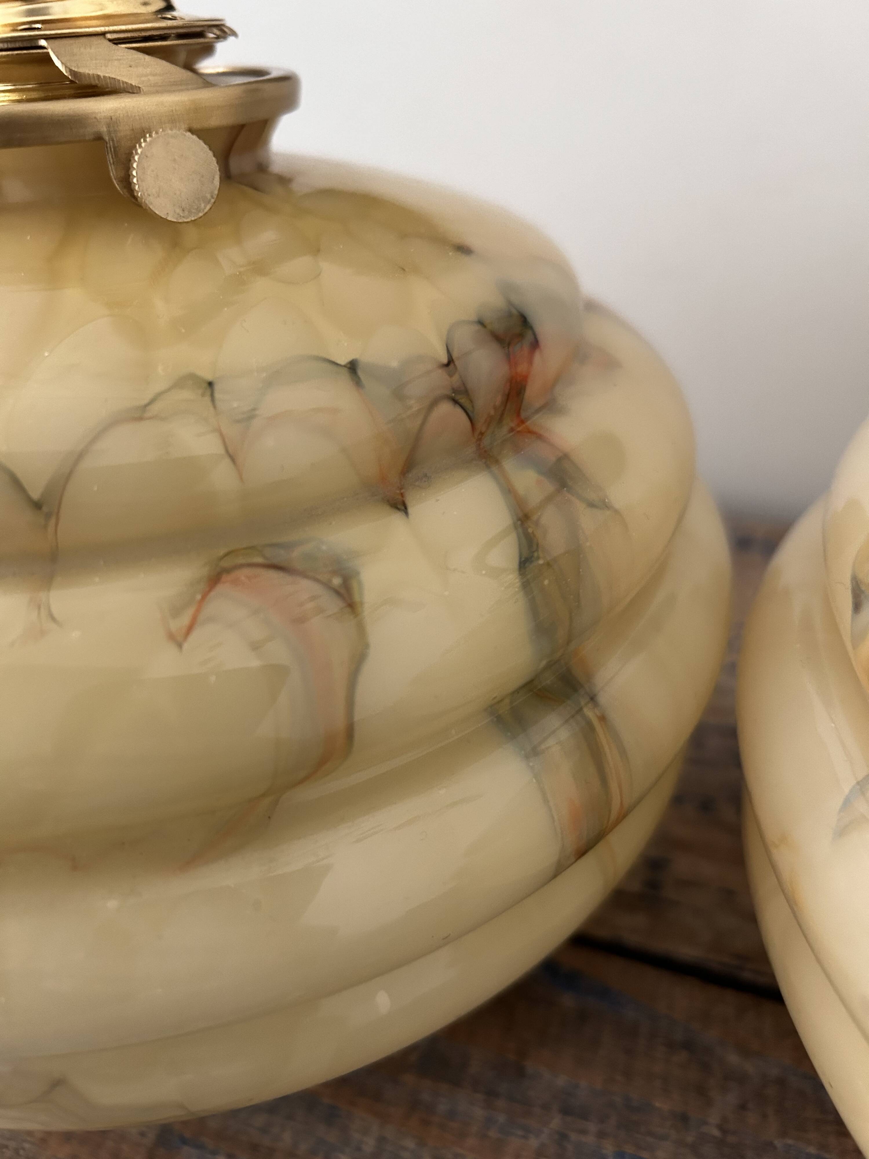 Pair of wall lights in marbled opaline