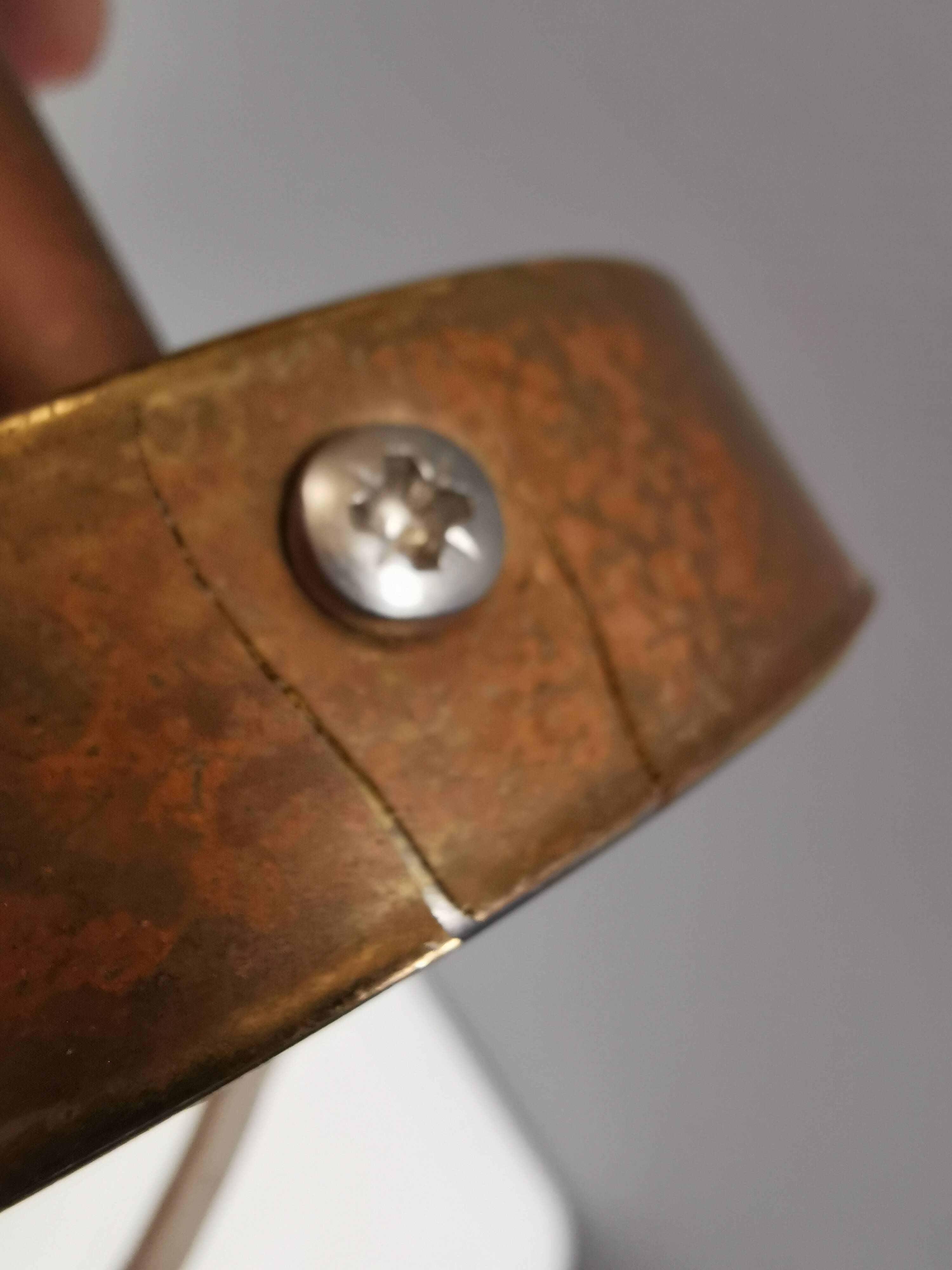 Older wall lamp in metal, brass and “cracked” glass.