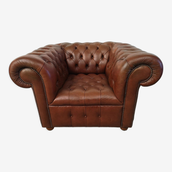 Brown leather chesterfield armchair