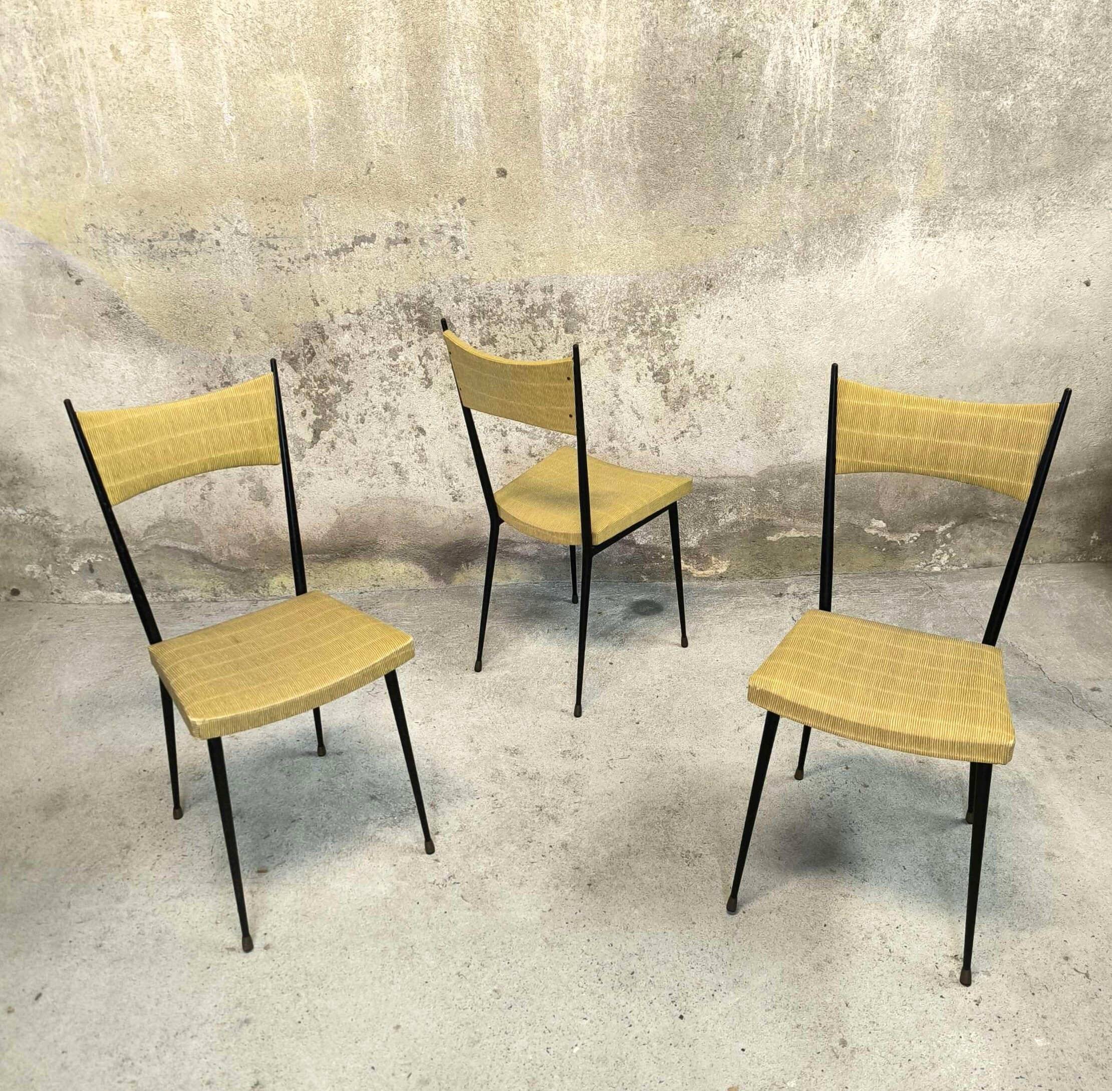 Three vintage chairs in the style of Colette Gueden.