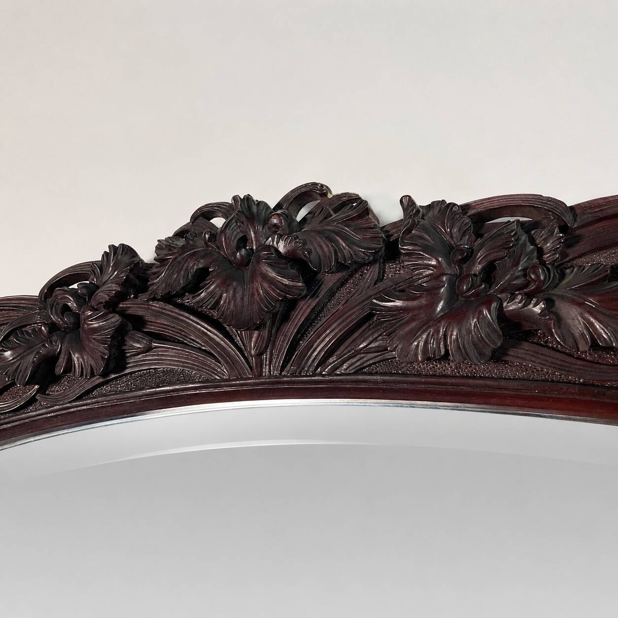 Large mirror (2 metres) Art Nouveau in carved mahogany with high-relief decoration.
