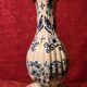 Antique ceramic lamp with brass or bronze base from the attic
