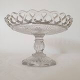 Old cup in molded glass colorless decorative table mignardises