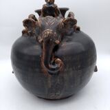 Antique Khmer ceramic vase. With elephant decoration.