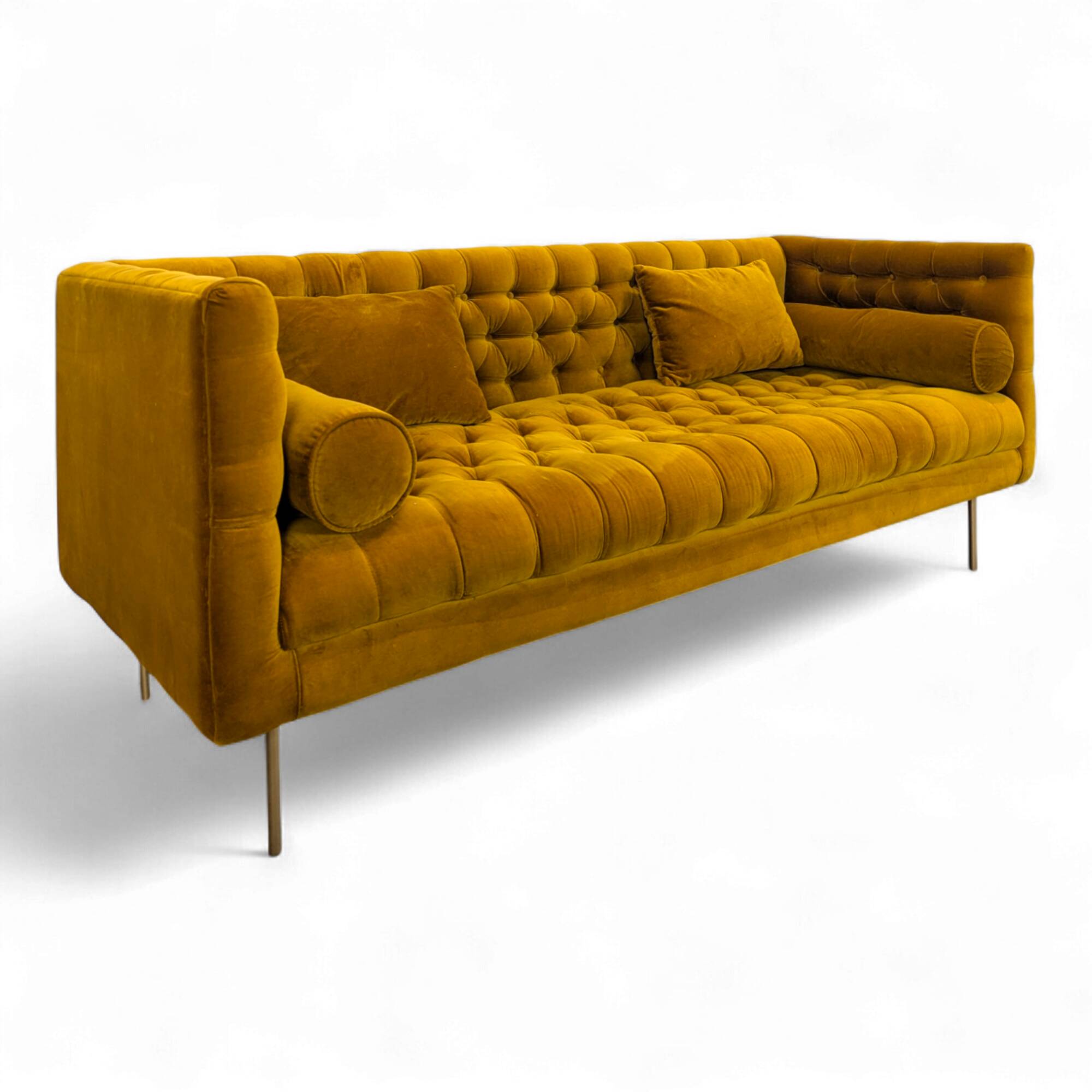 Saffron-colored velvet sofa