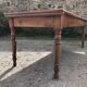 Antique Louis Philippe style farmhouse table in solid cherry wood with its 2 extensions.