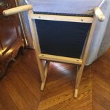 Hamilton chair in alcantara with his feet rest