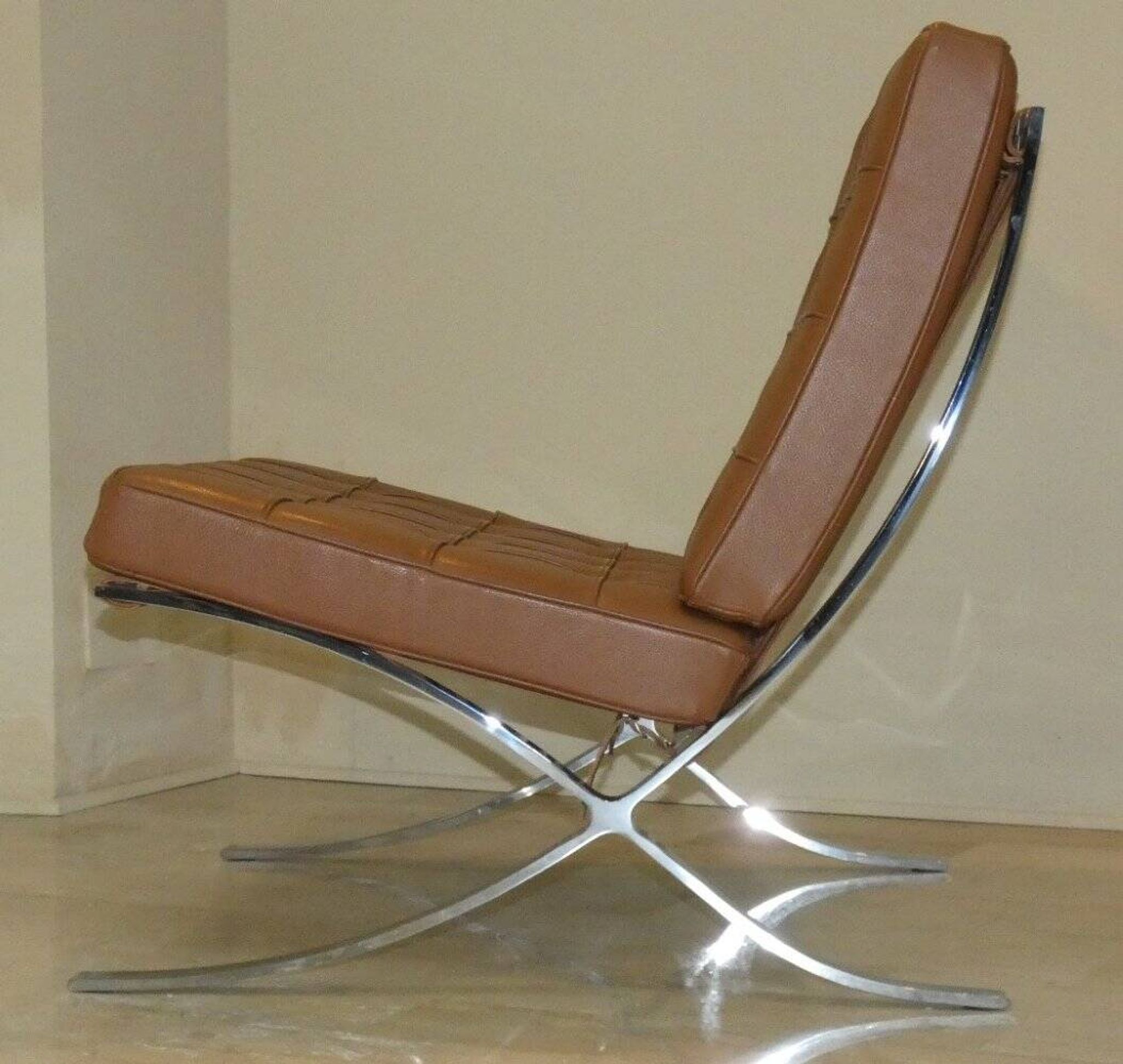 Steel and leather chair in the style of Knoll, 1980s.