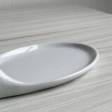Avignon white porcelain dish in the shape of a goat.
