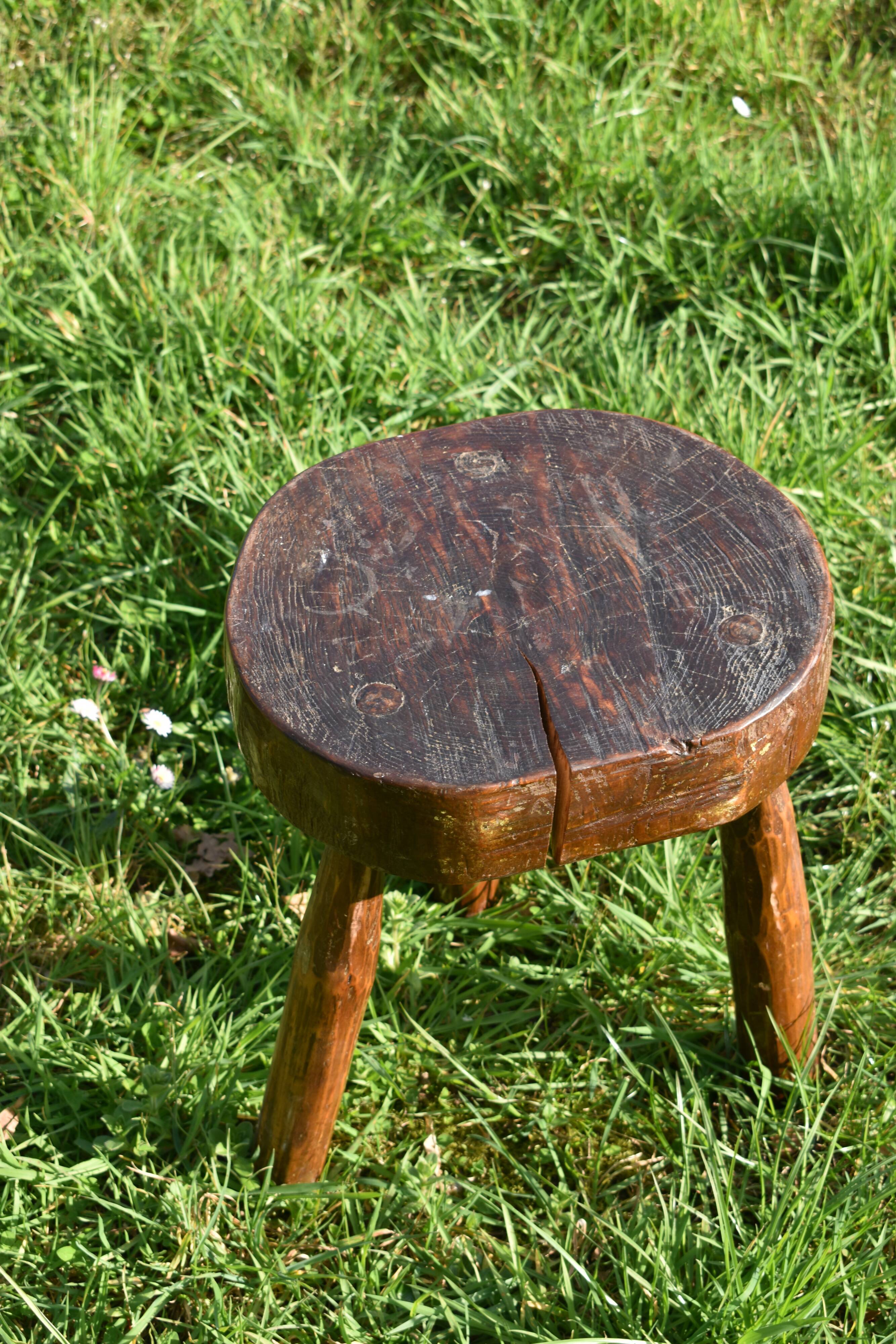 Ancient tripod brutalist stool