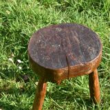 Ancient tripod brutalist stool