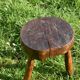 Ancient tripod brutalist stool