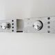 Pair of vintage chrome stainless steel wall sconces. Space Age