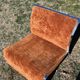 Chrome steel armchair and orange fabric by Vittorio Introini