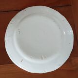 Ancien plat rond en faïence de l’est, motif floral