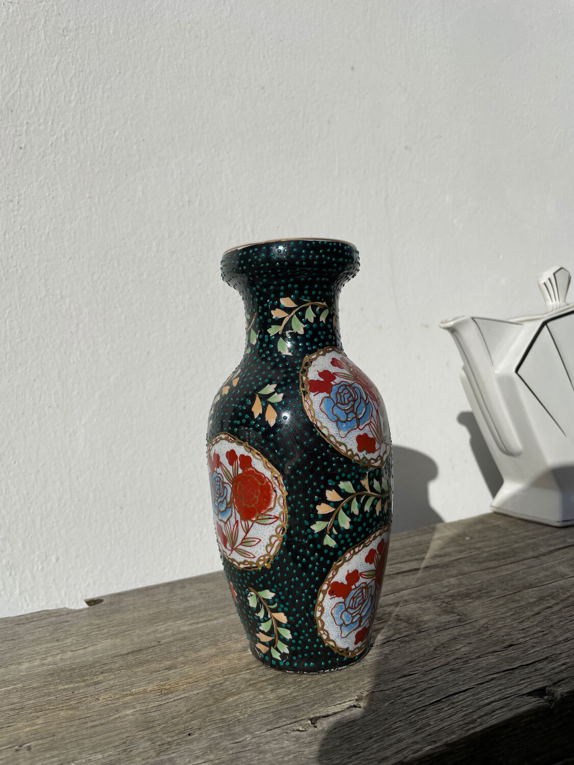 Asian vase in black ceramic with floral decoration