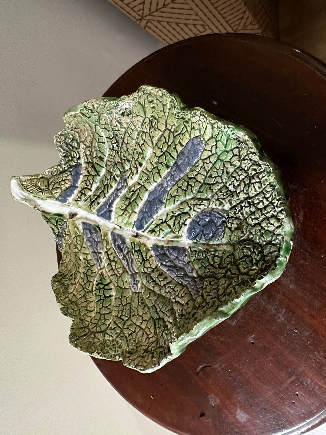 Vintage ceramic leaf-shaped vide poche, signed.