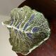 Vintage ceramic leaf-shaped vide poche, signed.
