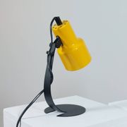 A pair of well-designed minimalist bedside lamps.
