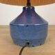 Blue ceramic lamp foot and white wool lampshade