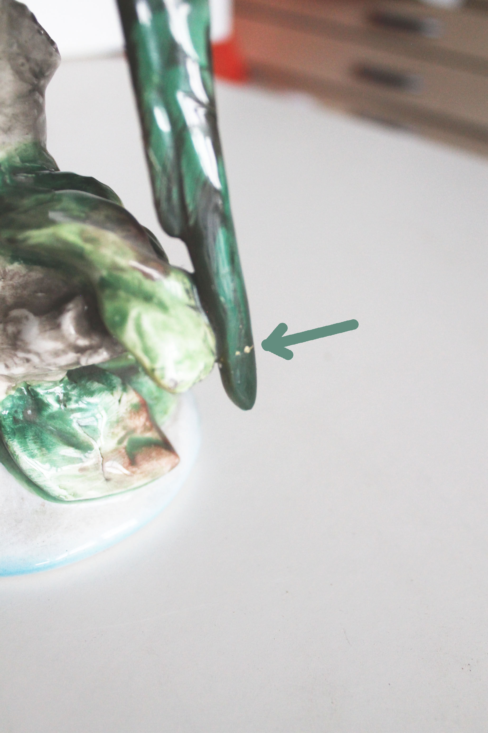 Couple of ceramic parakeets