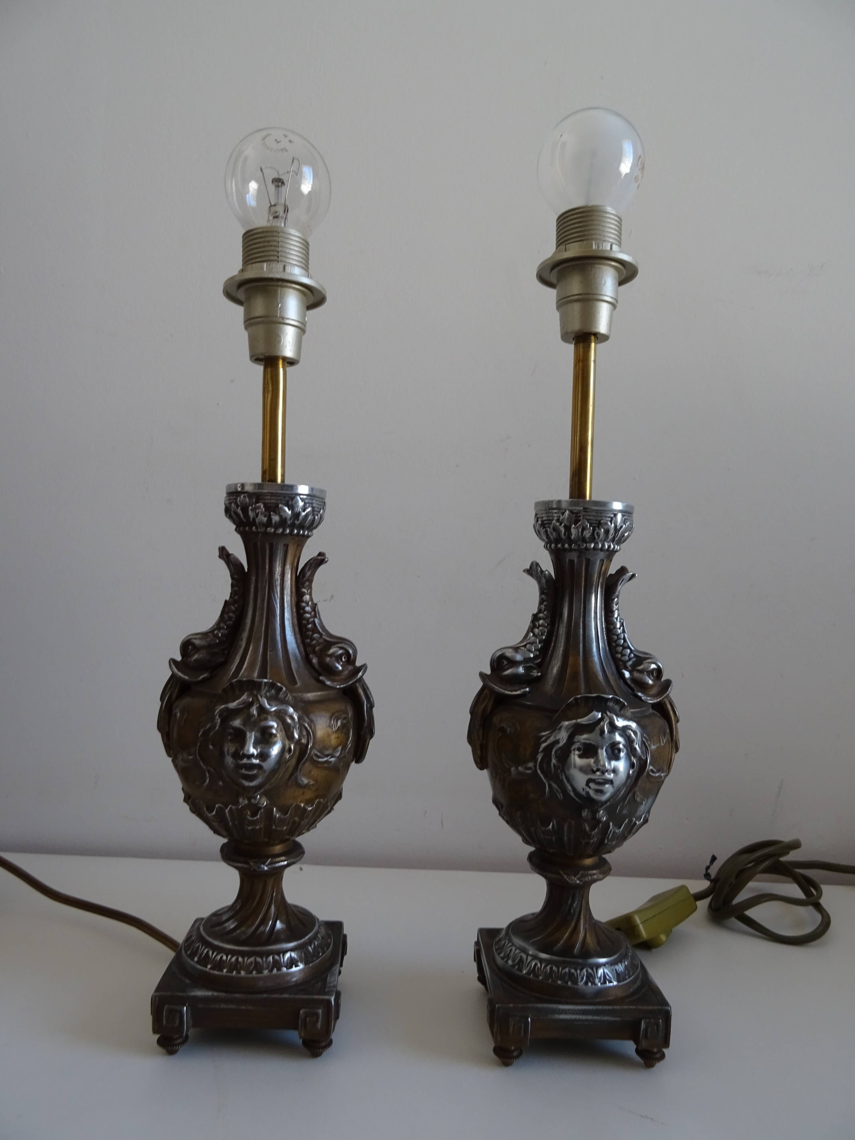 Pair of Louis XVI style lion and cherub decoration lamps
