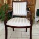 Pair of carved armchairs in Empire style – mahogany wood
