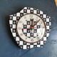 Vintage silent asymmetrical wall pendulum clock "Black and white checkered flowers"