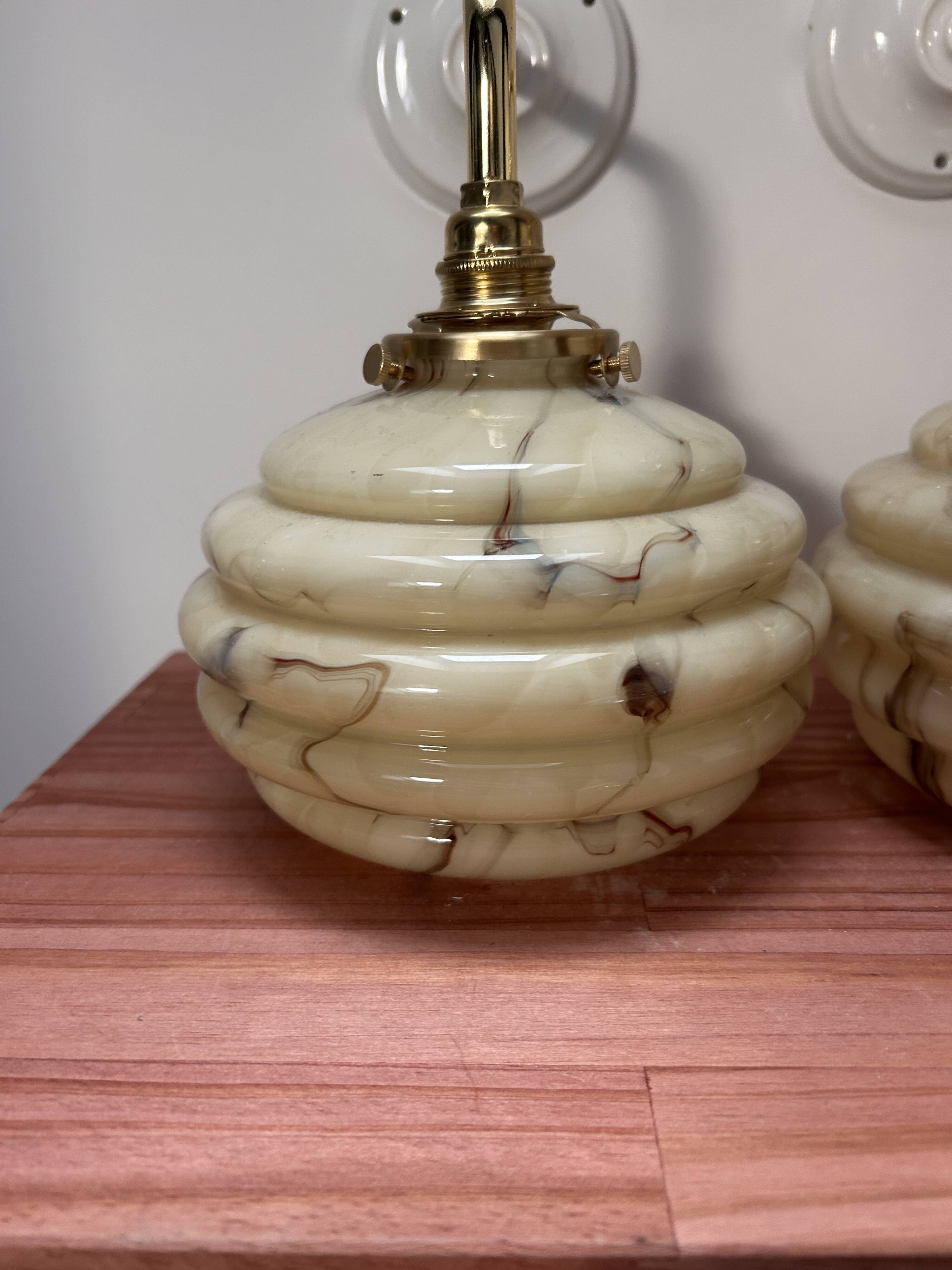 Pair of vintage marbled opaline globe wall lights