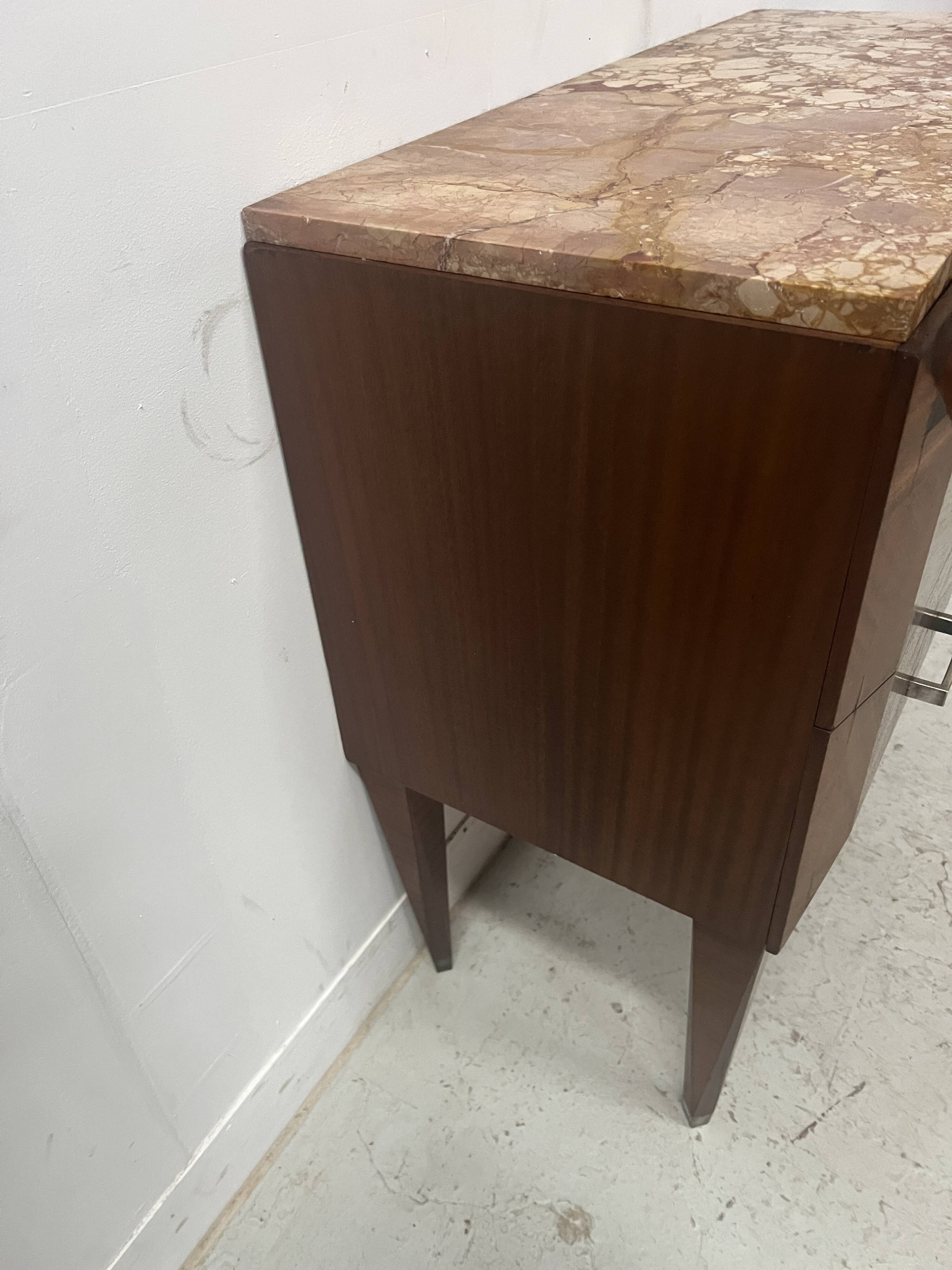 Art Deco chest of drawers with cut sides in mahogany veneer, 20th century