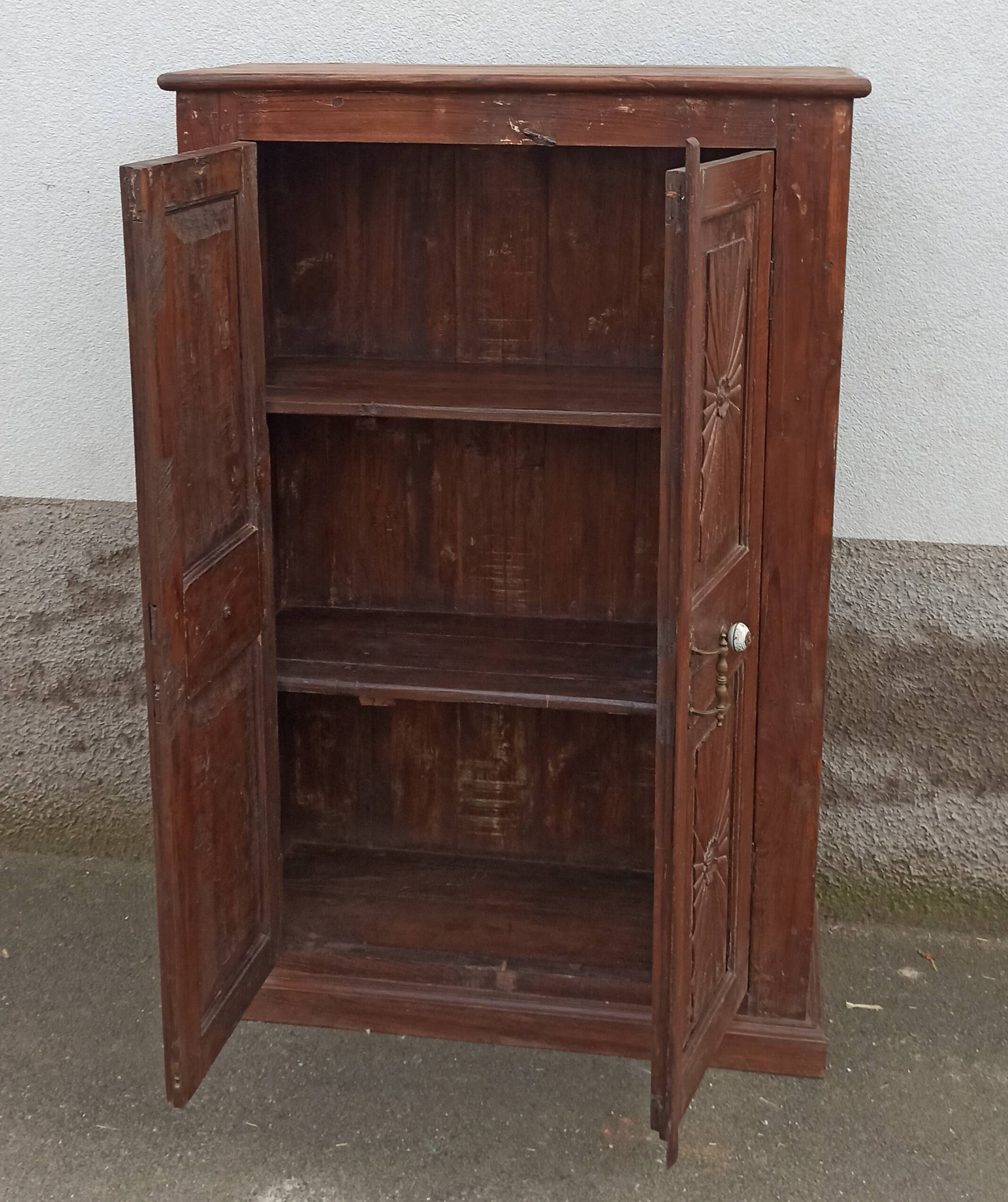 Old wooden cabinet with ceramic handles