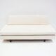 Italian modernist daybed with white upholstery and iron frame.