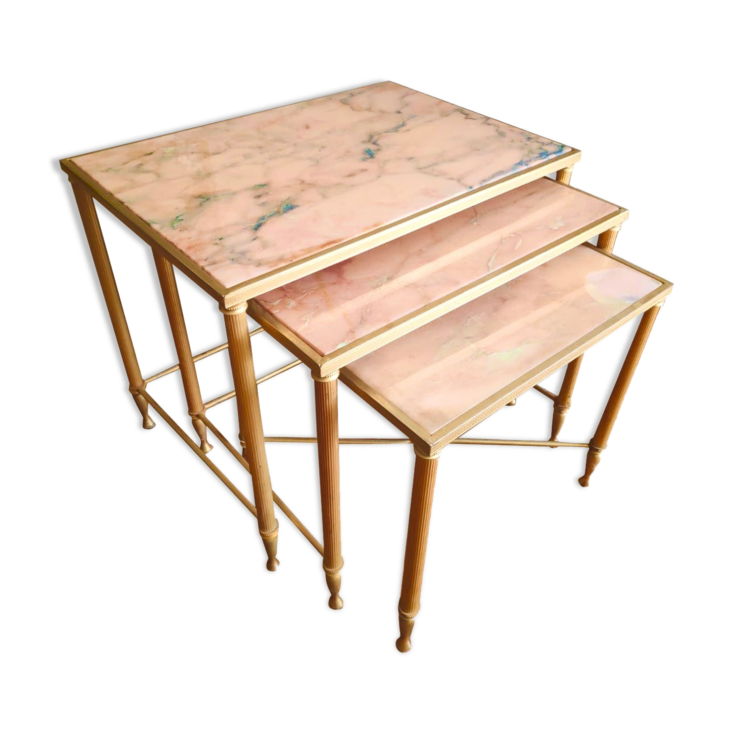 Tables in brass and pink marble