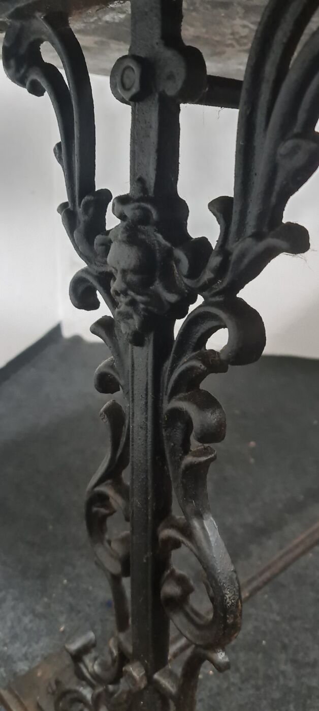 Vintage cast iron and stone garden table