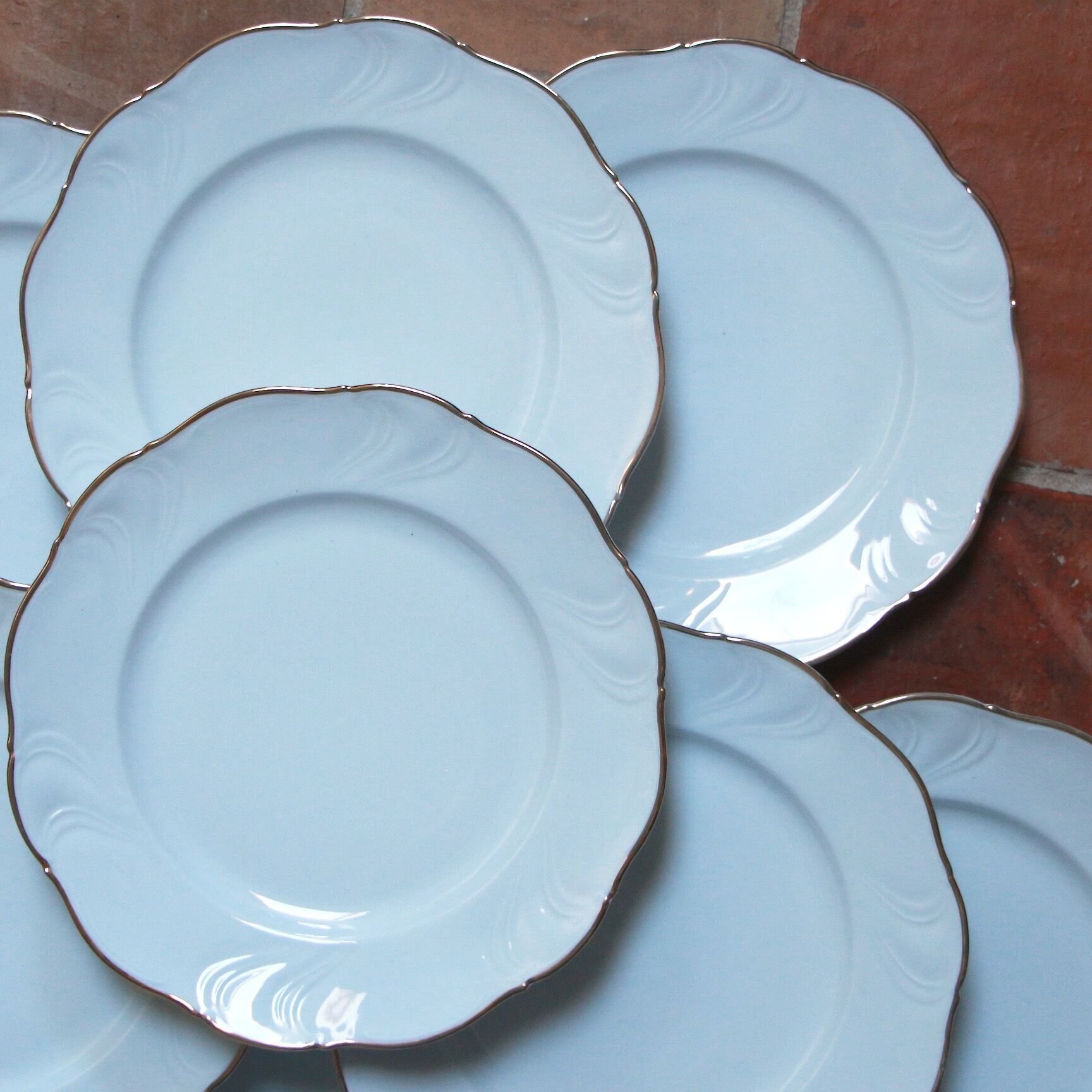 White and gold porcelain plates