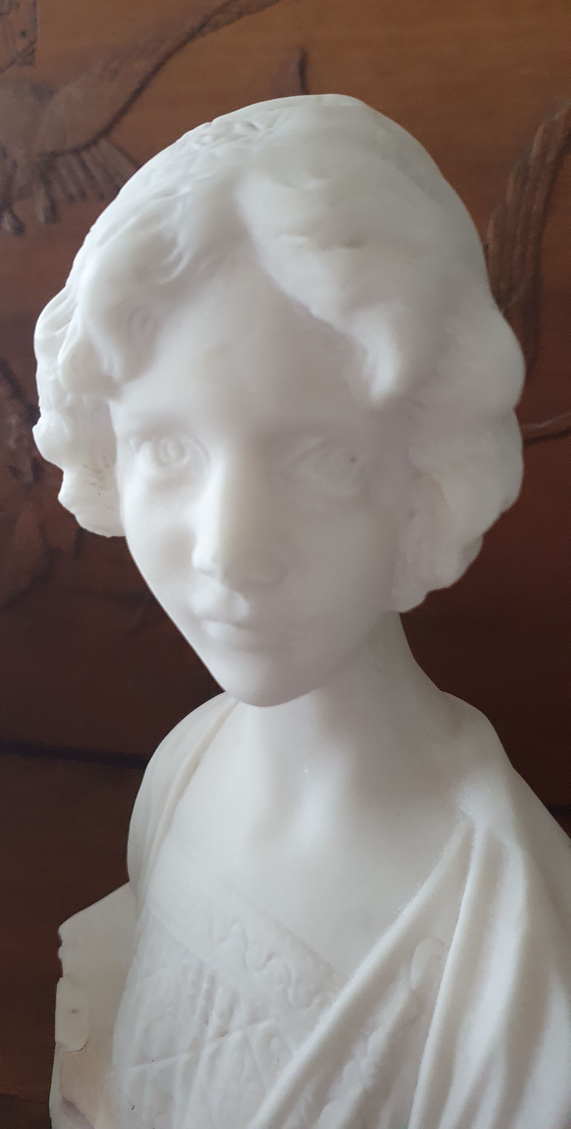 Bust of young woman L.Mignon