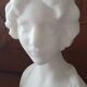 Bust of young woman L.Mignon