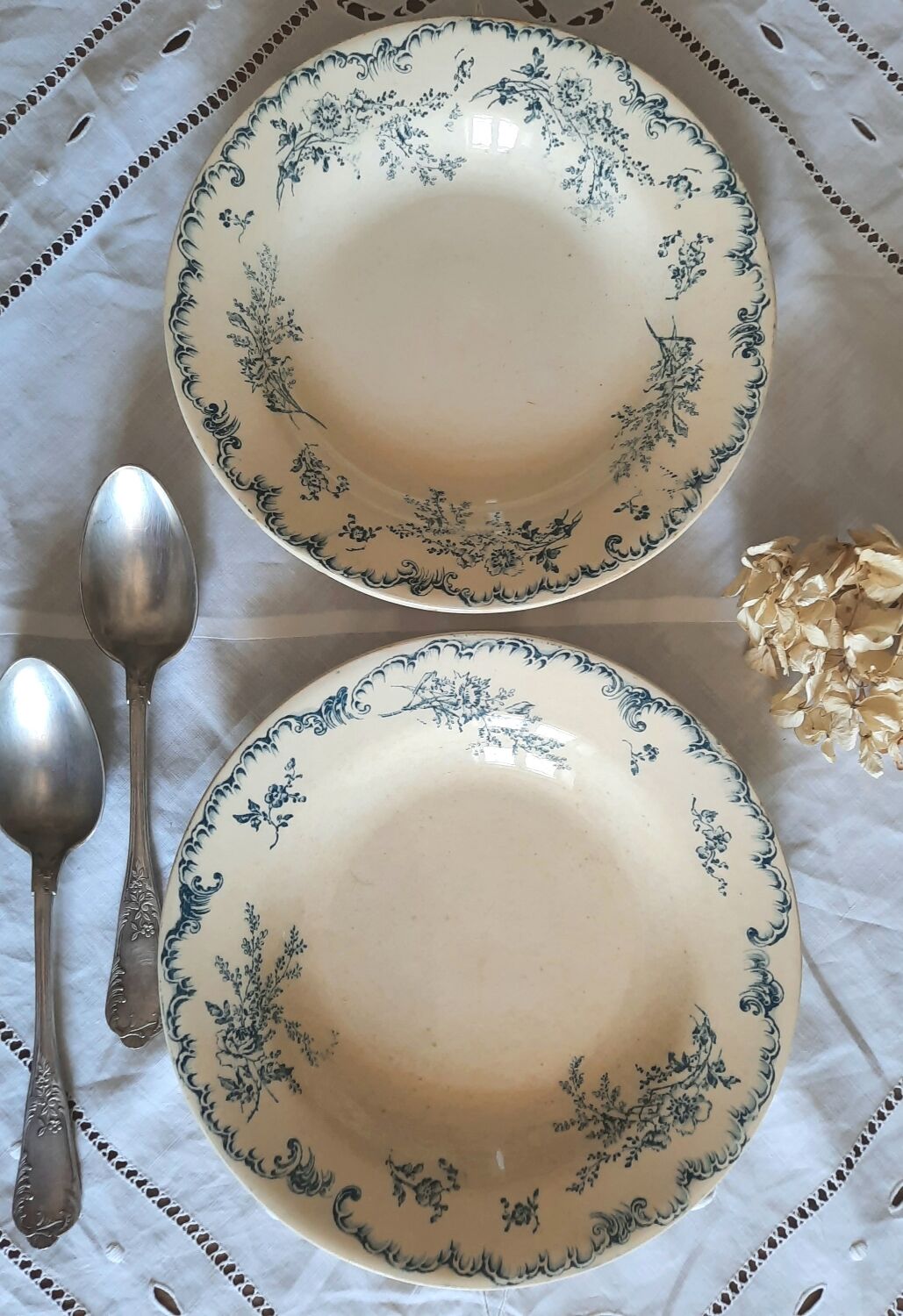 Old mismatched hollow plates in iron earth earthenware