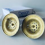 Pair of bronze candle holders signed