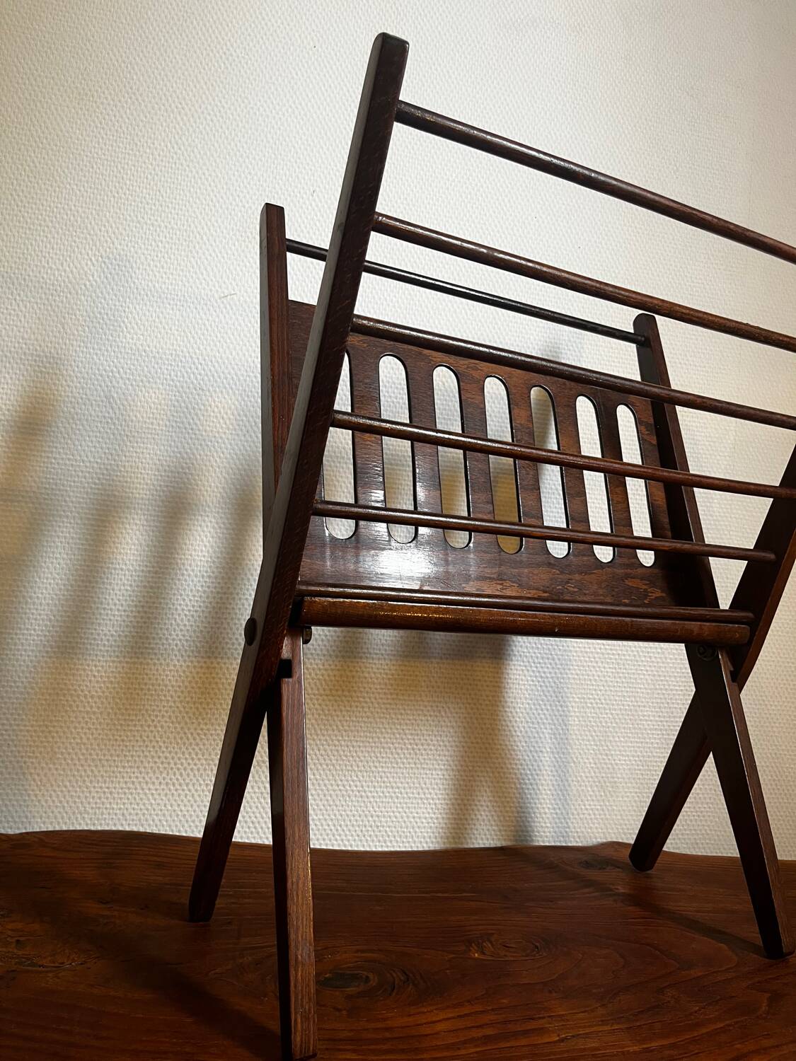 Magazine rack by Cees Braakman in varnished beech, circa 1960