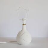 Small lamp with matte finish ceramic base and printed scalloped lampshade