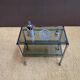 Metal and smoked glass dessert table