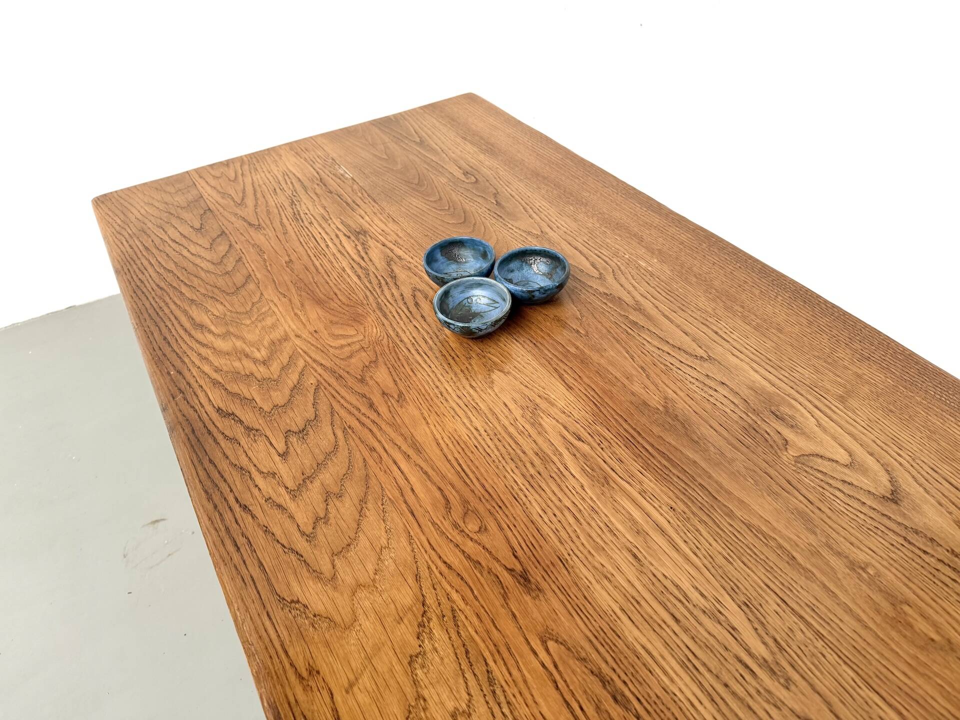 Solid oak farmhouse table, square legs.