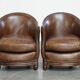 Set of 2 club chairs/armchairs in dark cognac leather