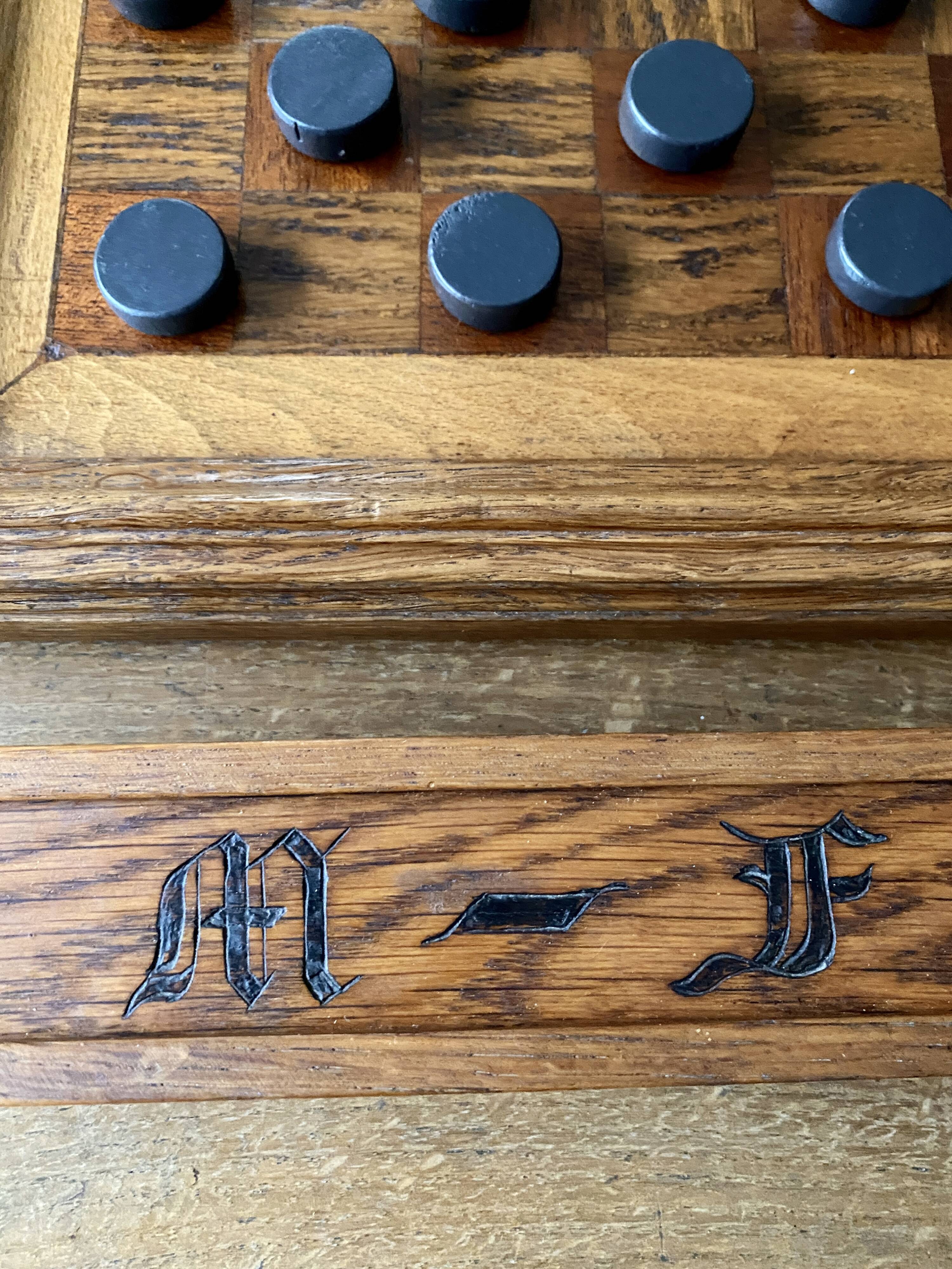 Old wooden checkers board