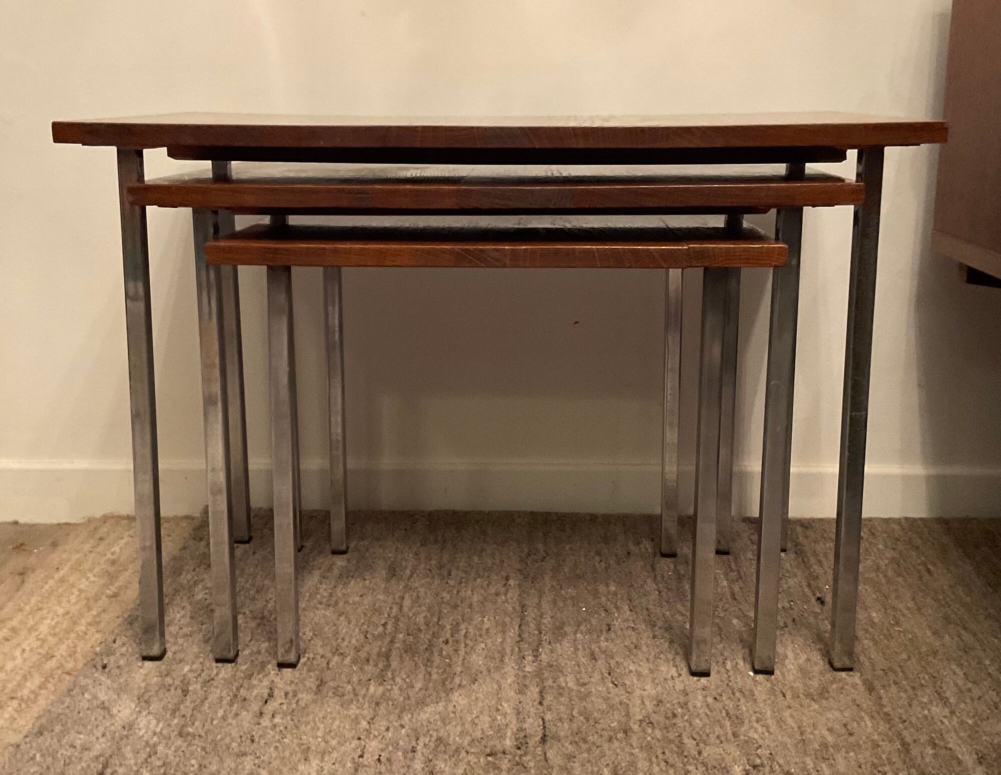 Series of 3 nesting tables from the 70s in wood and chromed metal